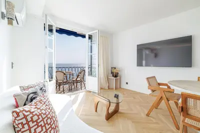 a living room with a view of the ocean at Outstanding View on the Promenade - Awesome 2 Bdr in Nice