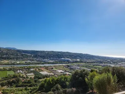 a view of a city from a hill at 2 pièces avec jardin vue mer in Saint-Laurent-du-Var