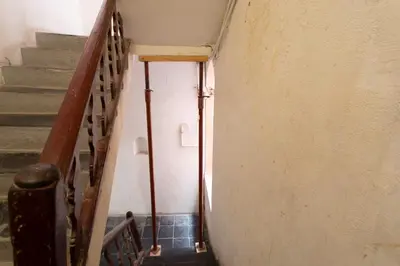 a staircase in an old building with a stair case at #36 Bright Eagle Nest Old town 5 mins from sea AC Wifi in Nice