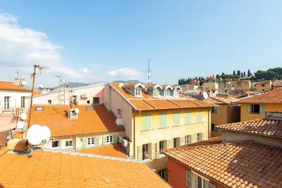 a view of roofs of buildings in a city at #36 Bright Eagle Nest Old town 5 mins from sea AC Wifi in Nice