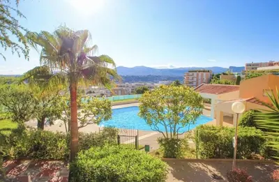 a balcony of a building with a view of trees at Le Cocon in Nice