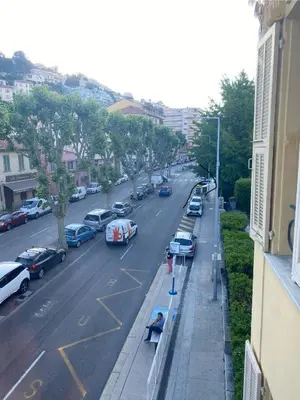 a view of a city street with cars parked at Zgondoiu Résidence in Nice