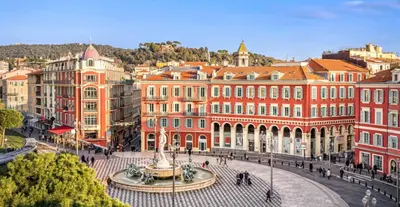 a city with a fountain in front of buildings at Le Carré D'or 2 Pers Centrale WiFi AC in Nice