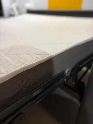 a close up of a mattress on a bed at Studio 27m2 en résidence standing piscine in Nice