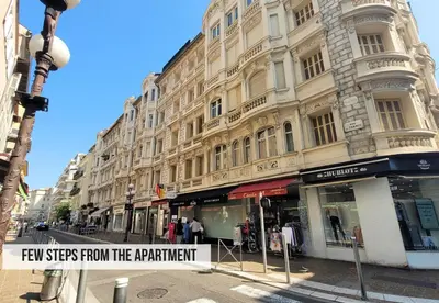 a building with a sign that reads few steps from the apartment at Nestor&Jeeves - BELA VISTA - Central - Close sea in Nice