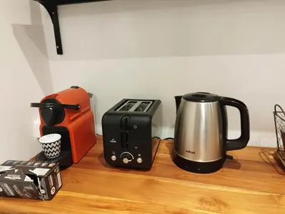 a counter with a coffee maker and a toaster at Old town Nice, near Flower Market in Nice