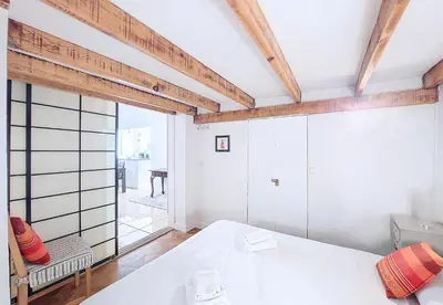 a bedroom with a white bed and a table at Nestor&Jeeves - SQUARE PROMENADE - Central - Close sea in Nice