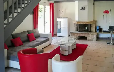 a living room with a couch and a fireplace at Gorgeous Home In La Gaude in La Gaude