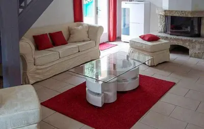 a living room with a couch and a glass table at Gorgeous Home In La Gaude in La Gaude