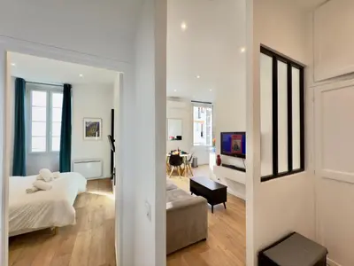 a bedroom with a bed and a living room at Ze Perfect Place - Chic & Cosy au Port Nice - AC in Nice