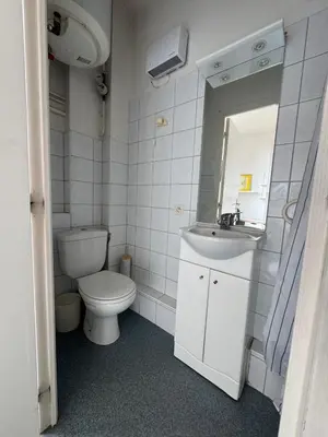a white bathroom with a toilet and a sink at LX137 1-Bedroom - Downtown Nice - Mobility Lease in Nice