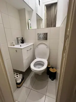 a small bathroom with a toilet and a sink at Perfectly located 1 bed apartment - Port of Nice in Nice