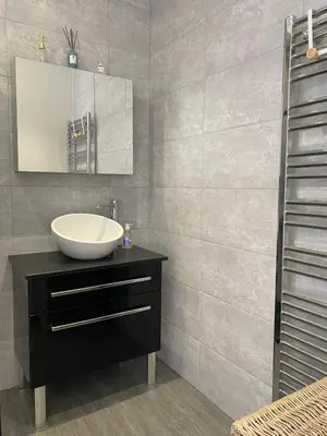 a bathroom with a sink and a mirror at Beautiful 2 rooms 45 m2 Nice in Nice