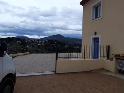 a driveway of a house with a view of a mountain at Gite Maïoun Cremat in Nice