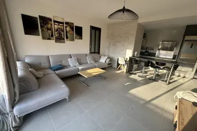 a living room with a couch and a piano at Spacious apartment in Nice with balcony in Nice