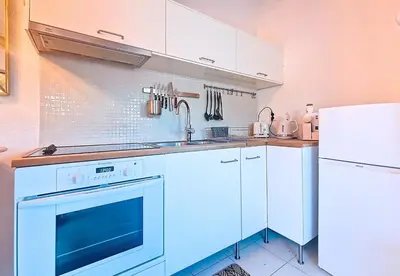 a kitchen with a sink and a dishwasher at Nestor&Jeeves - L ESCURIAL - Central in Nice