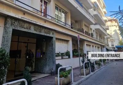 a building on a street with a building entrance at Nestor&Jeeves - TERRASSE D OR - By sea - Terrace in Nice