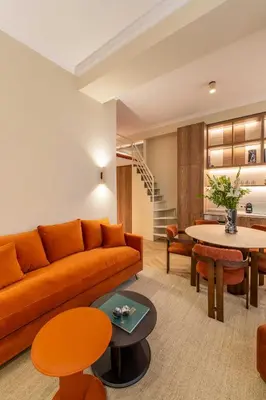 a living room with a couch and a table at 2BDR 6P central A C apt - heart of Nice in Nice