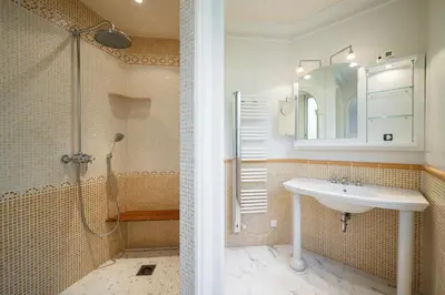 a bathroom with a sink and a shower at Vue exceptionnelle in Nice