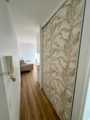 a hallway with a wall with a patterned wall at Hello sunshine nice in Nice