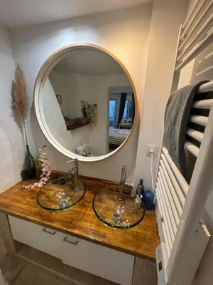 a bathroom with two sinks and a mirror at Auberge de la Croix du Pape in Èze
