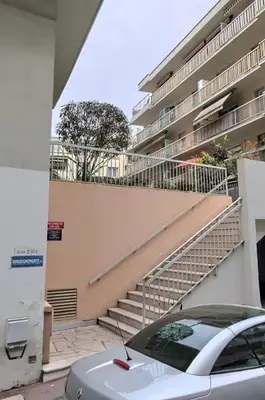 a car parked in front of a building with stairs at Nice - 6 personnes - 3 lits - 3 pièces - Parking ! in Nice