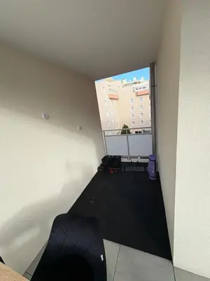 an empty room with a view of a balcony at Le Bonappart T3 Grande Terrasse in Nice