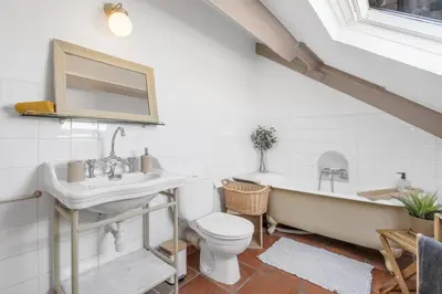 a bathroom with a sink toilet and a bath tub at Studio sous les toits, Nice Centre in Nice