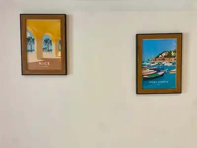two framed photographs hanging on a wall at T4 Nice Centre - Close to shops, Wi-Fi, AC in Nice