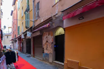 an alley with a red carpet on a street at La Casa Nissa in Nice