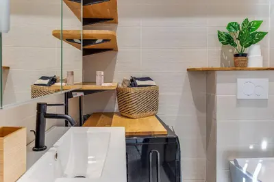 a bathroom with a sink and a counter top at STUDIO AZUR AP4487 By Riviera Holiday Homes in Villefranche-sur-Mer