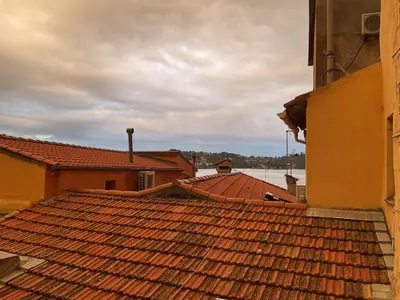 a view of the roof of a building at Duplex Apartment Old Town & Beach in Villefranche-sur-Mer