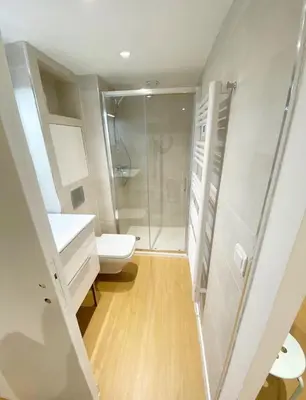a bathroom with a toilet and a walk in shower at Duplex studio 50 mètres de la plage in Nice