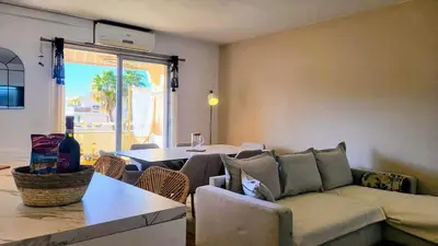 an apartment with a swimming pool and buildings at WeHost- CORNICHE Soleil Couchant 2 chambres 4pers,Parking,Piscine in Nice