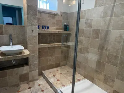 a bathroom with a shower and a sink at La Rotonde Art,elegance & romantisme au Coeur de Nice, à 2 pas du Negresco in Nice