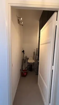 a hallway with a door leading to a room with a treadmill at Living Nice and French Riviera in Nice