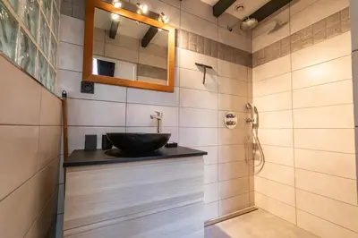 a bathroom with a sink and a mirror at Dolce Vita Clemenceau - Nice City Center 4 People in Nice