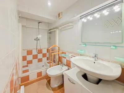 a white bathroom with a sink and a toilet at Place Grimaldi - Wifi, AC, 3pers in Nice