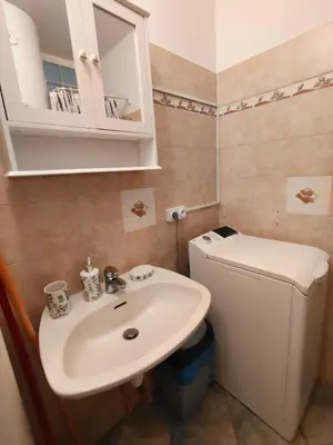 a bathroom with a sink and a toilet at Good studio in Nice