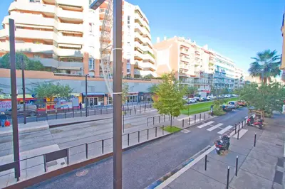 a view of a street in a city with buildings at Le Copacabana Riviera in Nice