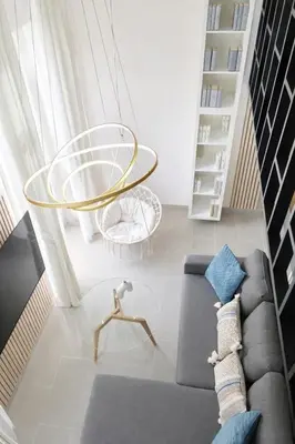 a living room with a couch and a table at Azur Carré d'or Duplex 6 pers 2 min de la mer in Nice