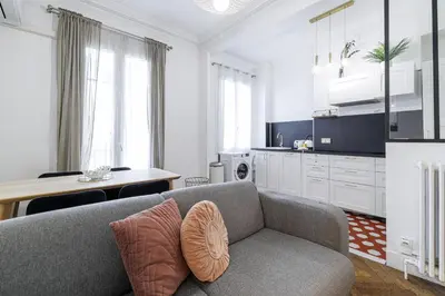 a living room with a couch and a table at Large 2 Bdr City Center close to Train Station in Nice