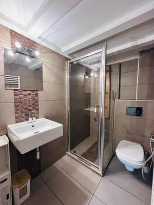 a bathroom with a shower and a sink and a toilet at Midnight Blue - Heart of Nice - Breakfast - AC -Wi-Fi in Nice