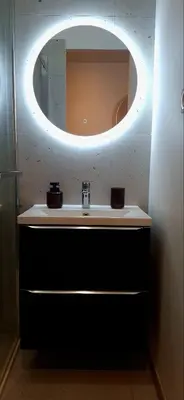 a bathroom with a sink and a mirror at Chambre arty & colorée en plein cœur de Nice in Nice