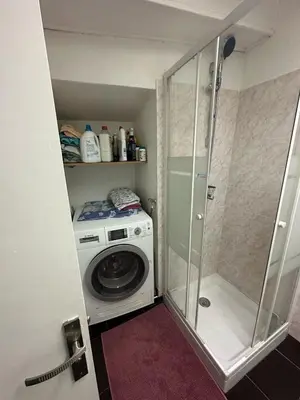 a washing machine and a washer in a bathroom at Old Nice appartement entier proche mer et plage et AC in Nice