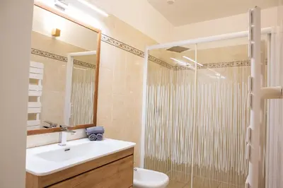 a bathroom with a sink and a shower at Duplex carré d'or au calme sur cour 100m de la plage in Nice