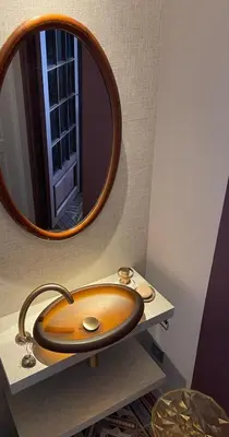 a bathroom with a sink and a mirror at Chambre Gounod in Nice