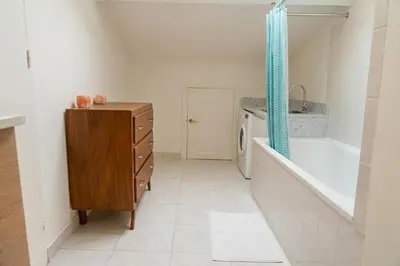 a small kitchen with a counter and a stove at Doux Pavillon - La Dolce Riviera in Nice