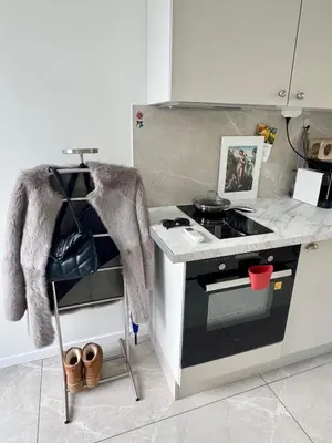 a kitchen with a stove and a counter top at Bijoux de carré d'or in Nice