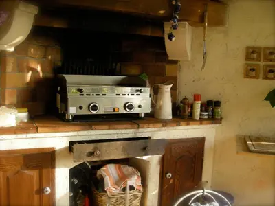 a toaster oven sitting on a counter in a kitchen at Villa les grimaldines côte d Azur in Cagnes-sur-Mer